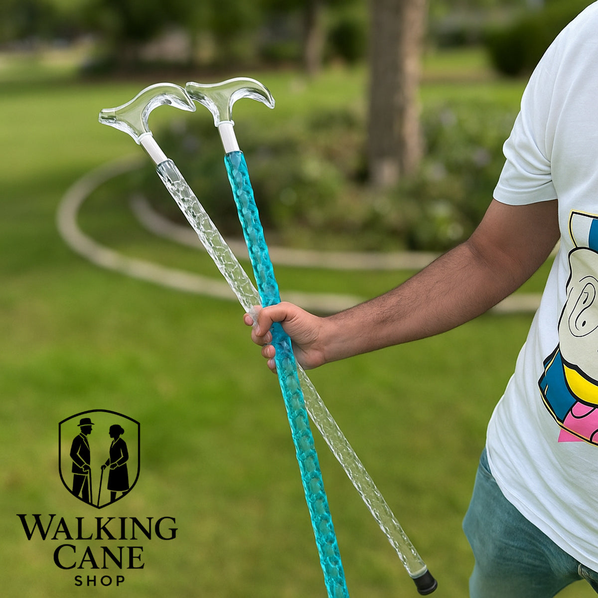 Pair of walking sticks – sea blue acrylic cane and transparent acrylic cane side by side